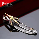 Pendentif Plume Griffe en Acier