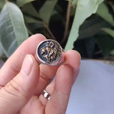 Bague tête de lion de profil en acier