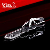 Pendentif Plume Griffe en Acier